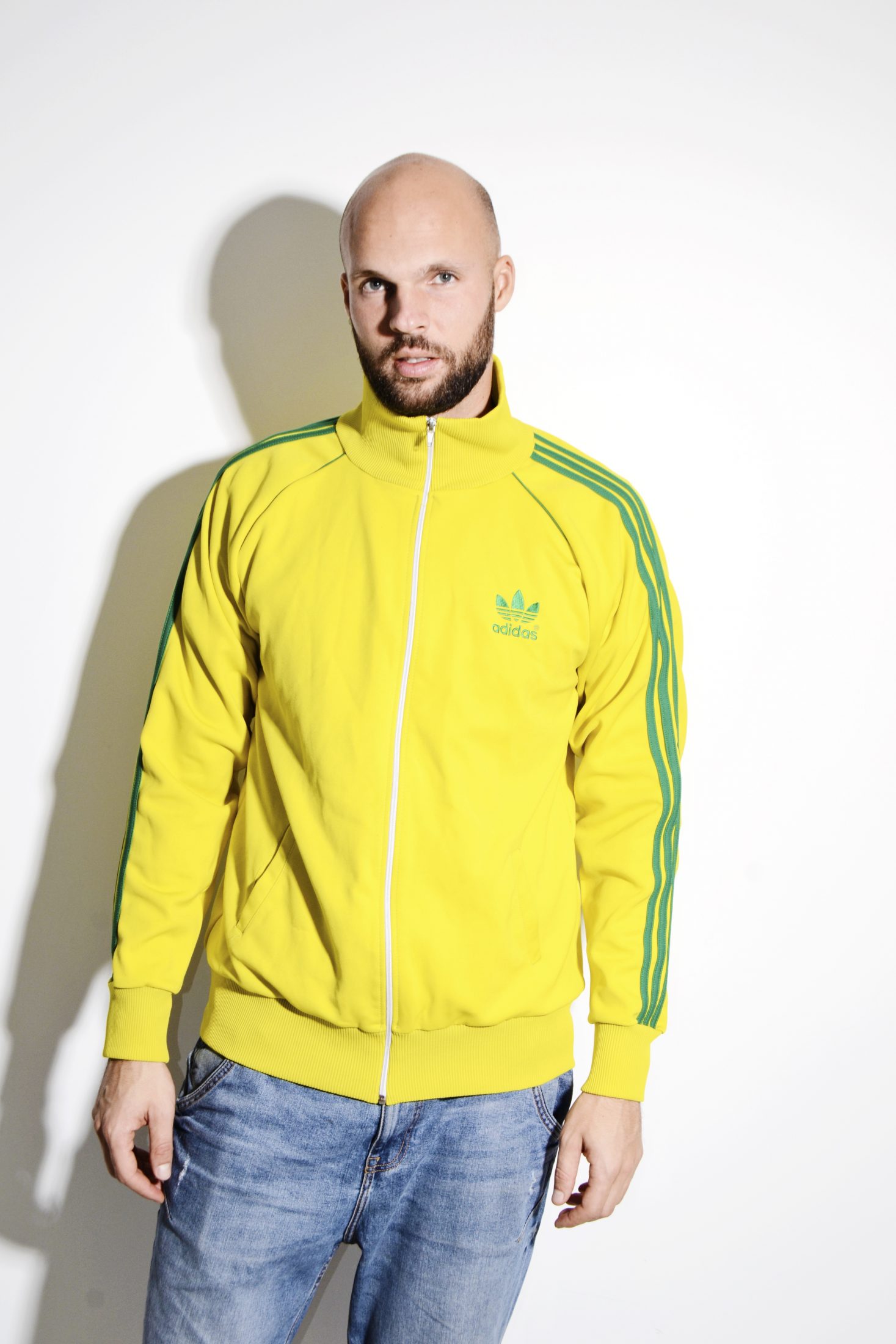 green and yellow adidas tracksuit